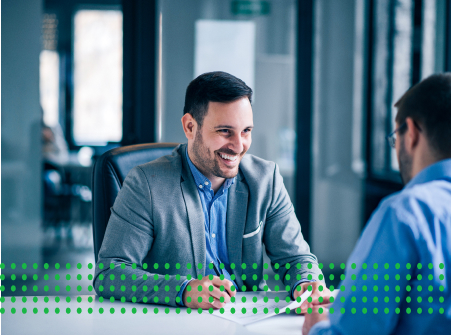 GET A PERSONAL LOAN FOR BUSINESS - photo graphics man sitting at conference table having conversation