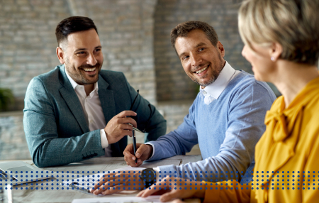 BUSINESS LINE OF CREDIT - photo graphics people sitting at office table smiling