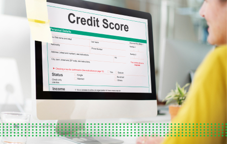 Residential loan - photo graphics man looking at screen with credit score written on it