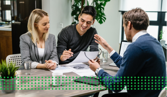 WITH A COMMERCIAL BUSINESS LOAN - photo graphics people having conversation at the office table