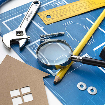FAST AND EASY HOME RENOVATION LOANS - photo graphics house blueprint pencil wrench ruler screws magnifying glass