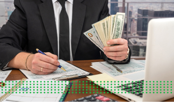 SECURE A BUSINESS WORKING CAPITAL LOAN - photo graphics writing on clipboard holding dollar bills