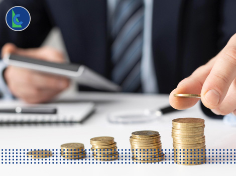 LOW INTEREST LOAN - photo graphics placing coin on a stack of coins