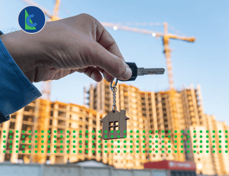 construction loan can be used for a number of purposes - photo graphics holding keychain at construction site