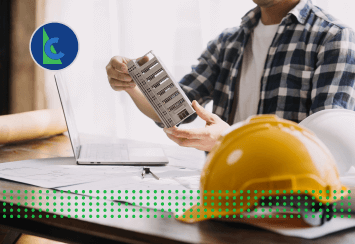 NEED TO FIND A CONTRACTOR - photo graphics holding building module laptop hard hat