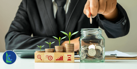 WHAT ARE THE BEST BUSINESS LOANS FOR 2024 - photo graphics man putting coin in a jar